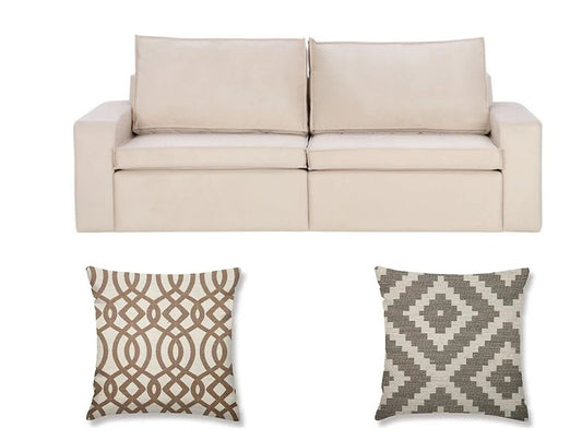 Como criar uma composição perfeita de almofadas para o seu sofá?